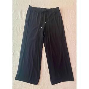 Joan Vass New York stretchy black linen like pants with underlining. Size large.